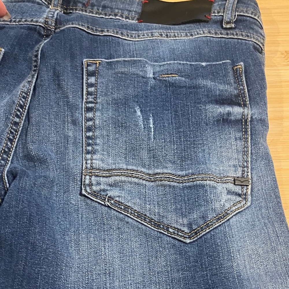 Distressed Blue Jeans - Picture 10 of 16